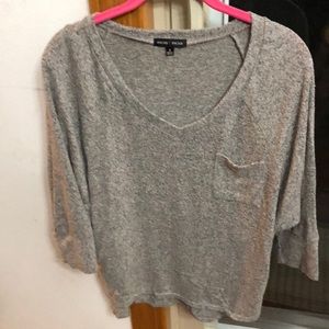 3/4 sleeve soft top with top pocket.